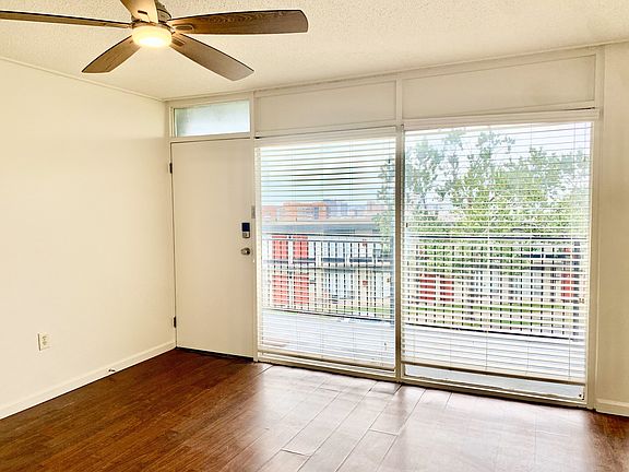 Living Room with keyless entry and natural light