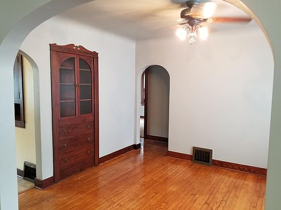 Dining room with built in cabinet and drawers