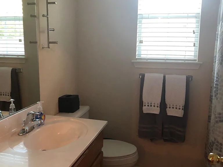 Second full bath upstairs has a bathtub and shower.