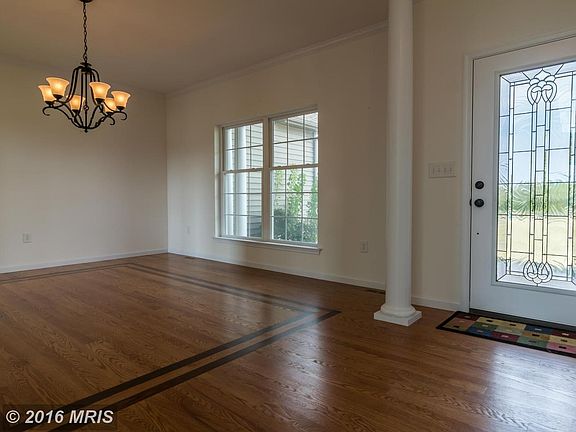 Dining room also showing front entry