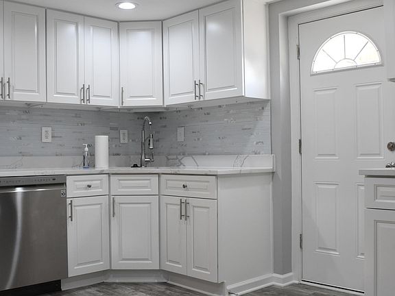 Shared kitchen. All new quartz counters and stainless steel appliances.