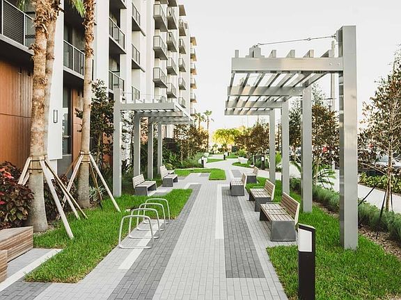 Enjoy the outdoors or walk your pup on the greenway at Modera Flagler Village