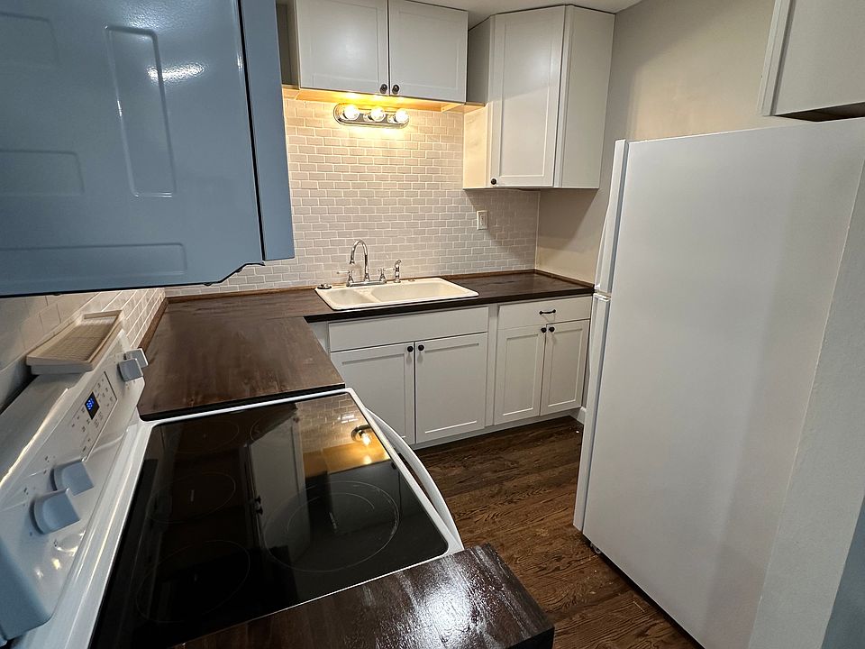 Kitchen - all new appliances, cupboards, countertops, and subway tile backsplash.
