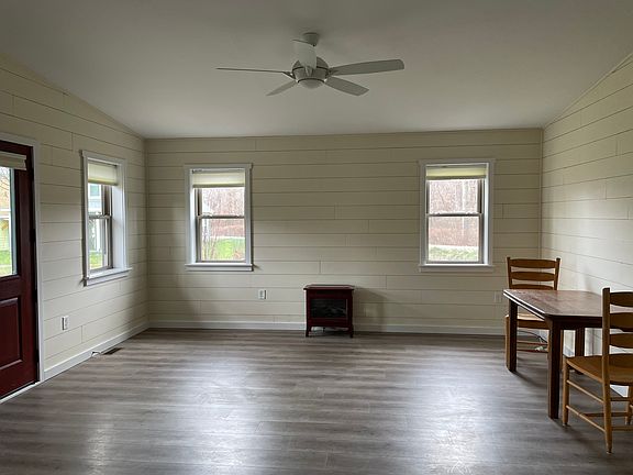 Living room is 15'9" x 13'. Electric fireplace adds warmth and charm.