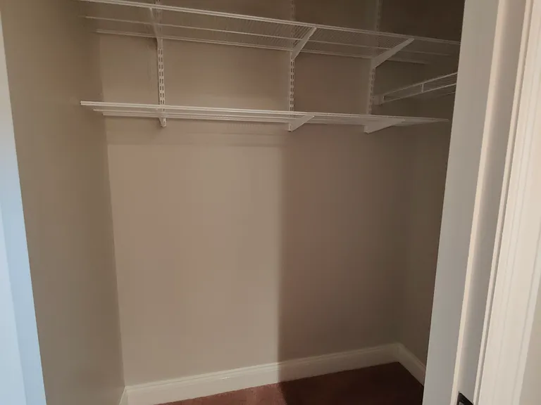 Back side bedroom walk in closet.