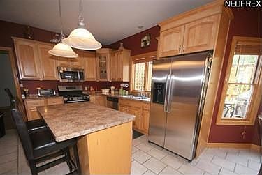 5th image of 8739 Eastlynn Ave NW