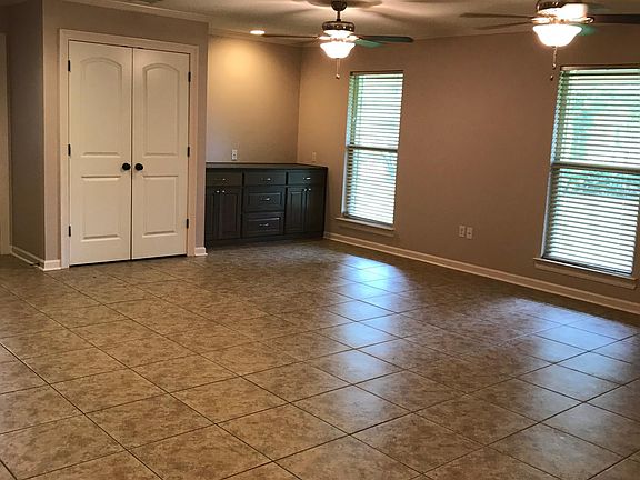 Coat Closet & Cabinet in Living Room