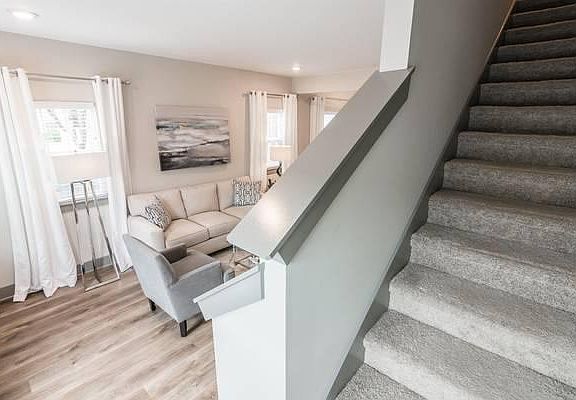 Stairs to right of entry door.