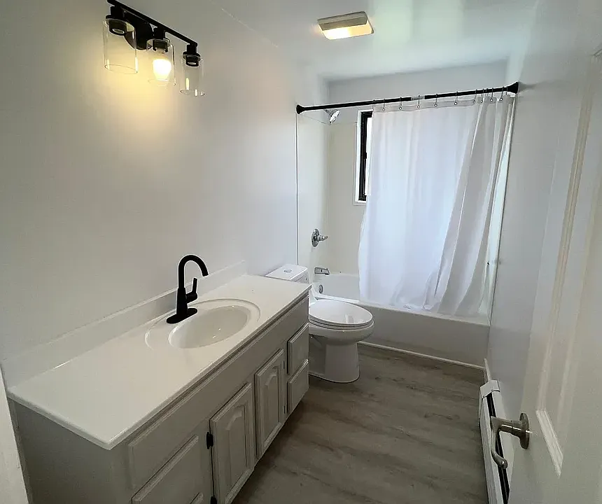 Completely remodeled bathroom with new vanity.