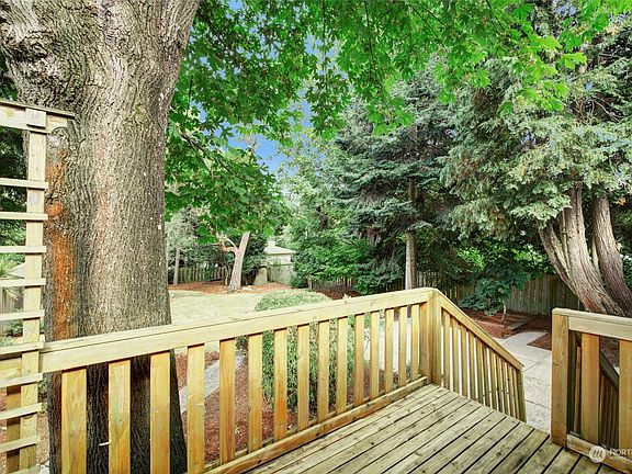 Great rear yard as viewed from the deck. Fenced and with tons of options for play structures, fire pit, outdoor dining - you name it!>