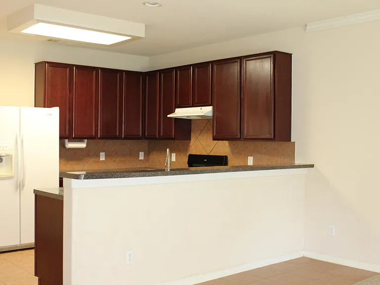 open concept with kitchen over looking the living room
