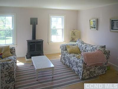 Cozy living room with gas stove.