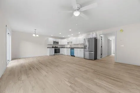 Nice, bright recessed lighting throughout with dining light and ceiling fan light - 135 Surry Rd #A