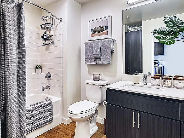 Griffis Shoreline apartment bathroom with quartz countertops.
