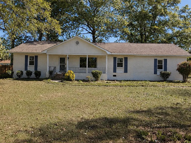 100 Rollingwood Dr — Photo 1
