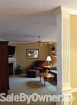 Family Room off kitchen
						:
						Open to kitchen and flat screen 42" TV stays!