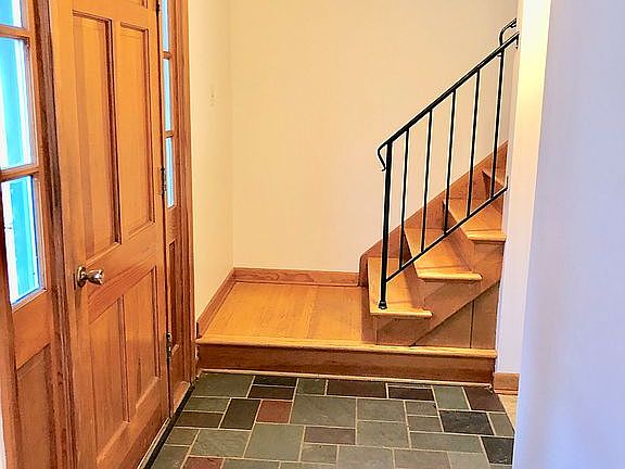 Foyer with natural slate.