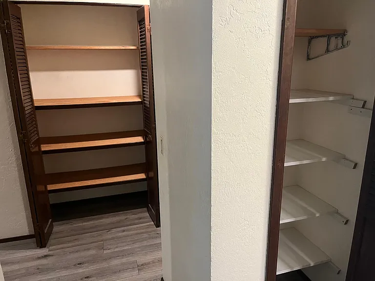 Pantry opposite kitchen at right, hall storage, closets everywhere. Additional closet in hallway not shown, and two large closets in bedrooms. Main hall with washer/dryer (both electric) hookup for tenant's own w/d.