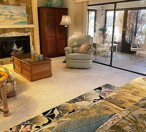 living room w real fire plac