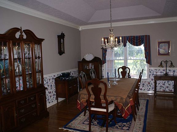 Formal Dining Room with Trey Ceiling and Hardwood