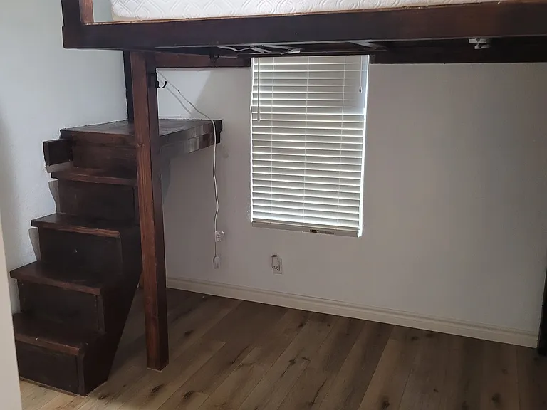 Stairs to full size size loft bed. No mattress included.