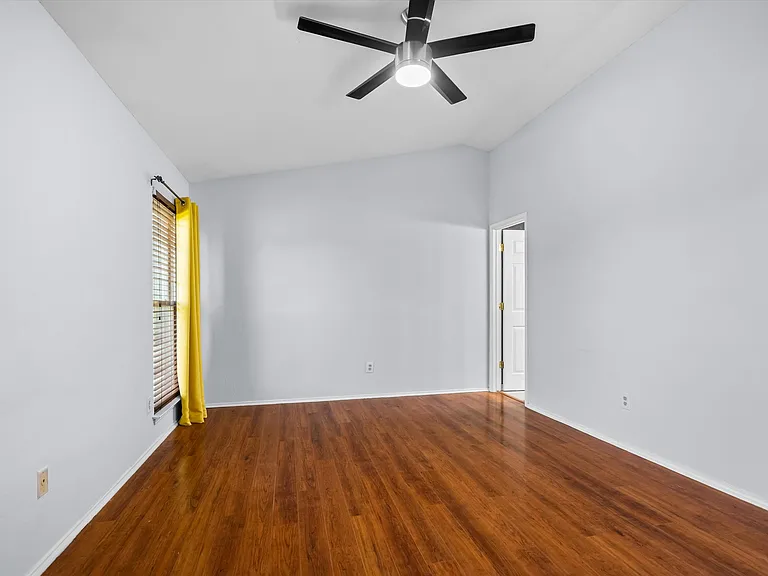The generously sized primary bedroom is upstairs.