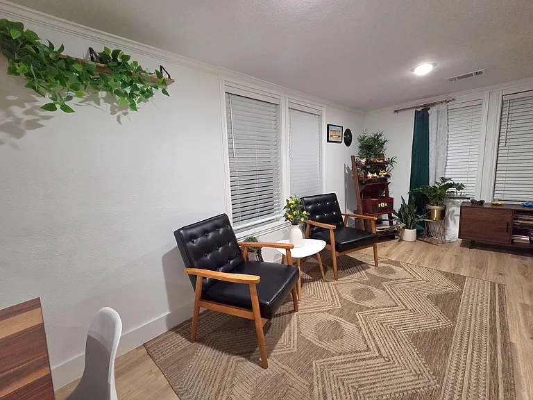 Lounging area is equipped with luxurious lounge chairs.