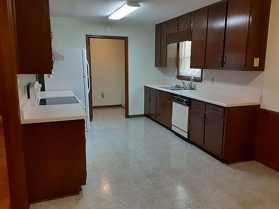 Door to laundry and pantry.