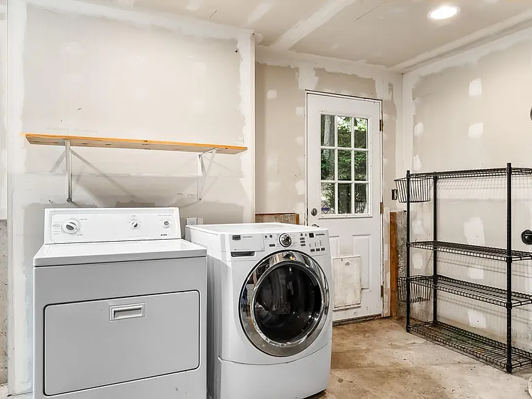 Washer & Dryer included in Garage on lower level.