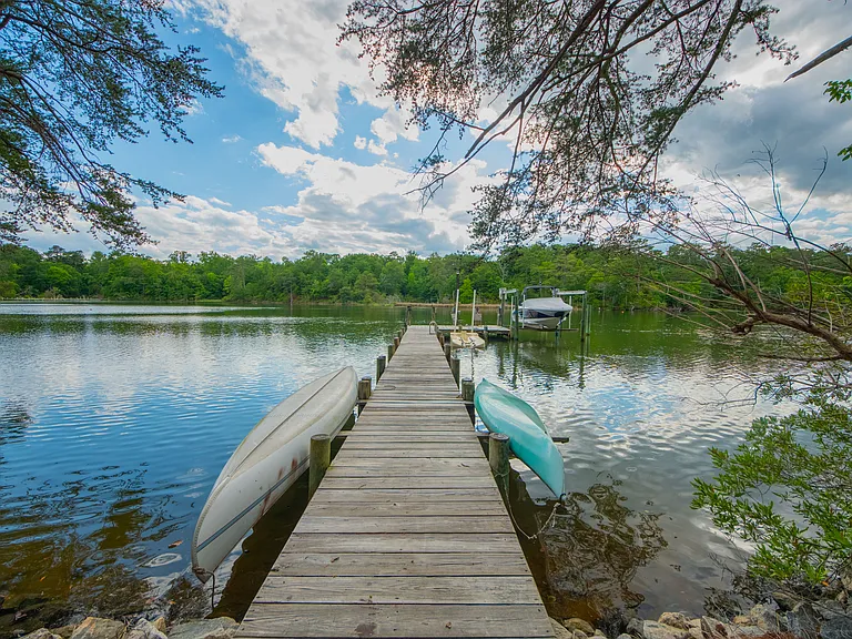 Dock with canoe and kayak. Don't forget your PFD.