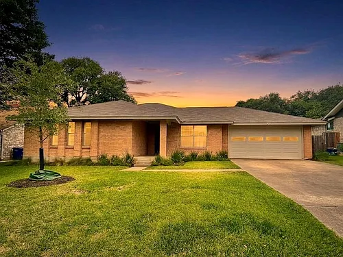 6703 Rustling Oaks Trl Photo 1