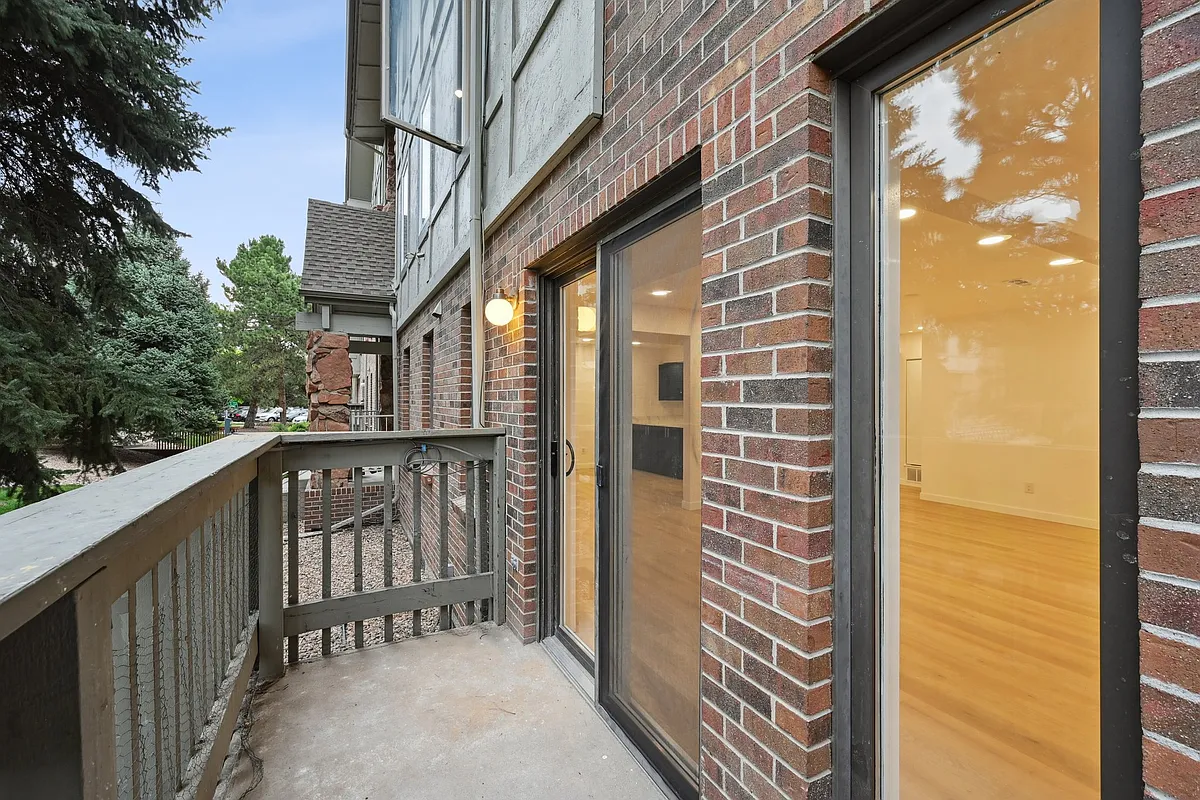 Building Photo - 6435 S Dayton St #108