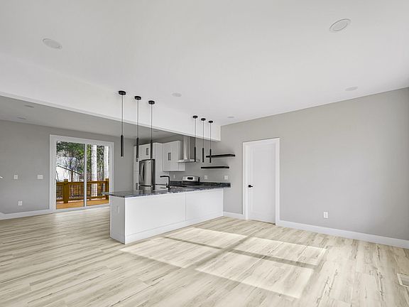 View upon entry with door leading to the Bonus Room.