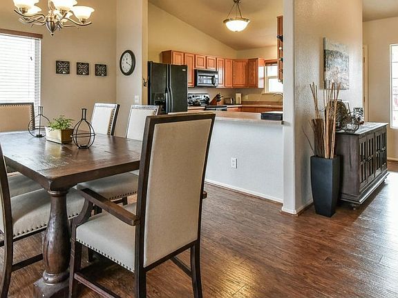 Beautiful laminate floors in dining room and entry