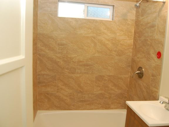 Remodeled bathroom is beautiful.