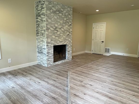 Chef's kitchen with oversized island, stainless appliances, and walk-in pantry _ perfect for cooking and entertaining.