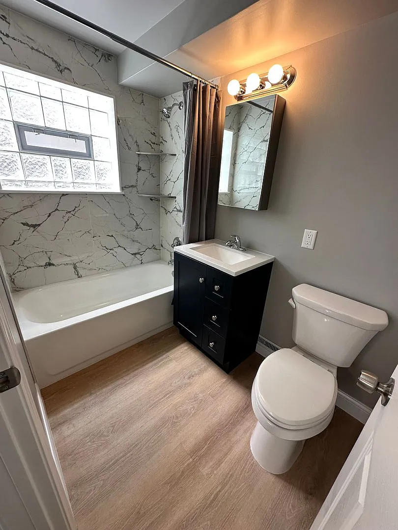 207 E 37th Ave — Photo 4