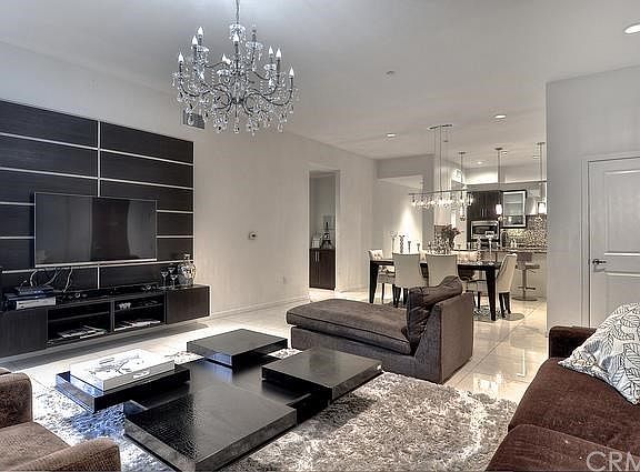 Enjoy an Extravagant Entertainer's Great Room complimented by a sleek and Romantic Formal Dining Area!