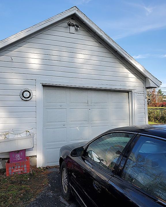 Needs  new garage door 