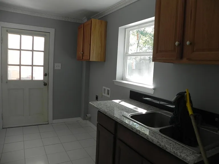 Laundry Room With Double Sink