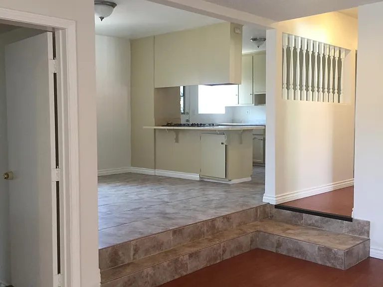 View from living room to kitchen and dining room
