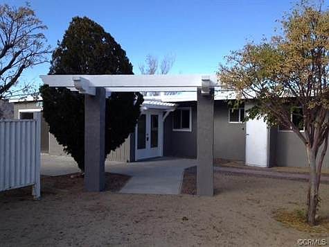 Enter into this home through new french doors.  Home has new ac/