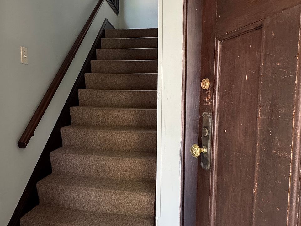 Apt 3 is on the Second Floor of this Triplex Building