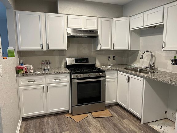 Kitchen -- new dishwasher will be placed in space