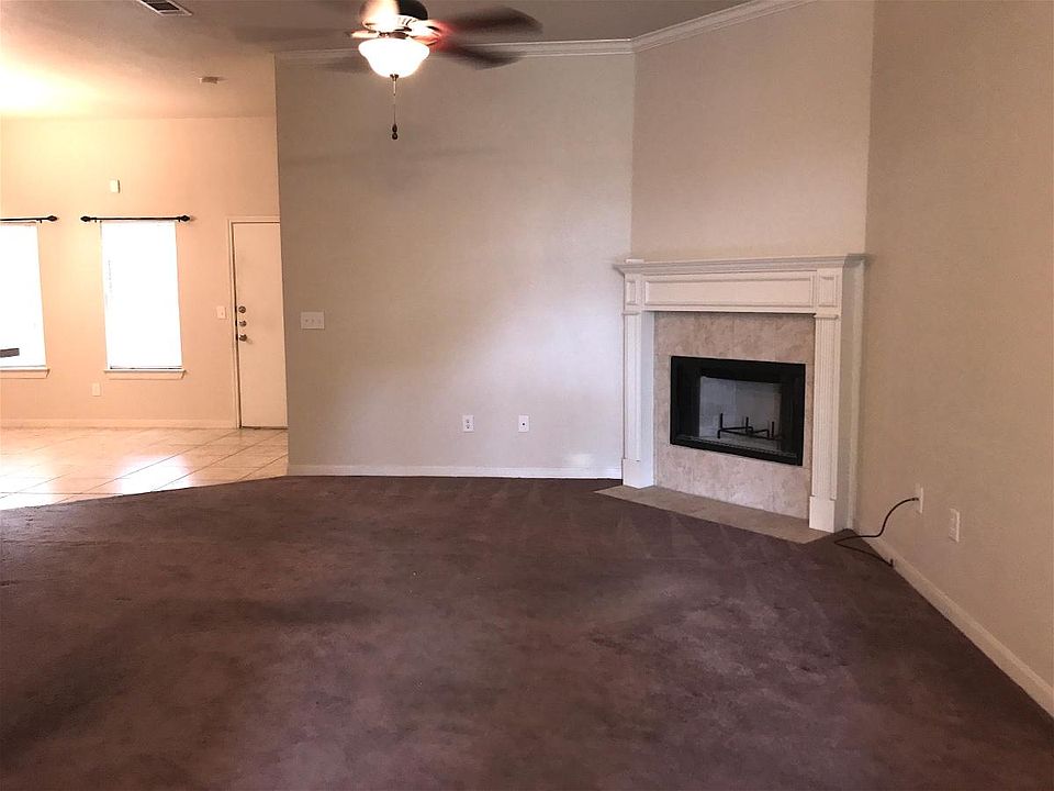 Living Room w/Wood Burning Fireplace