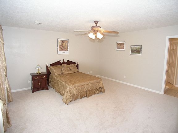 Master bedroom downstairs also with recent carpet and paint