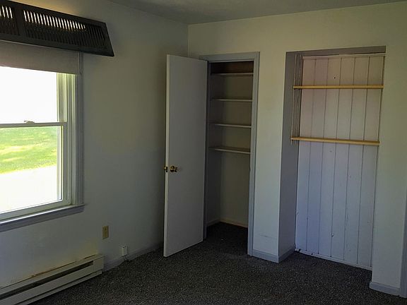 Smaller bedroom with two closets