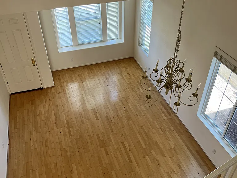 View from second floor: Living room, Dining room, and Chandelier.