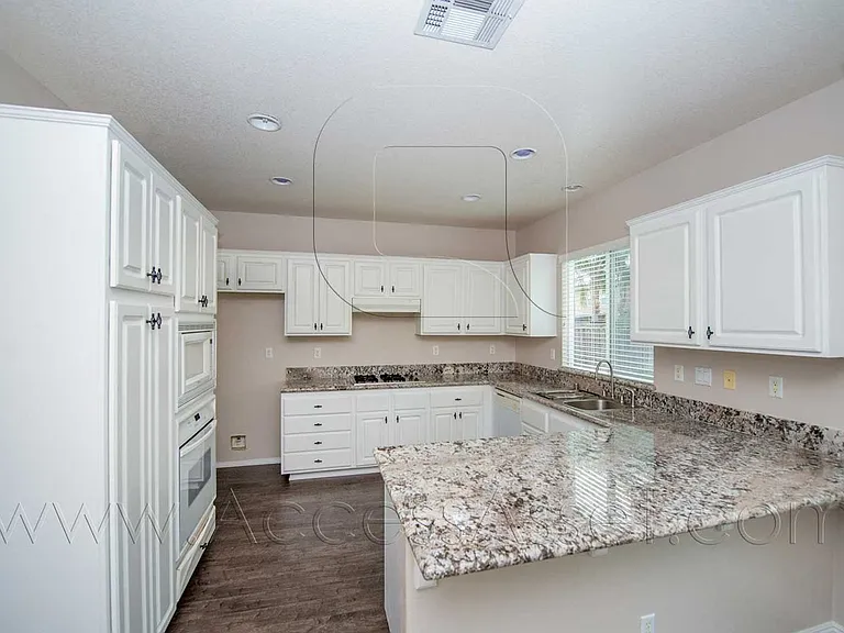 6303 Plum Ave — Photo 4