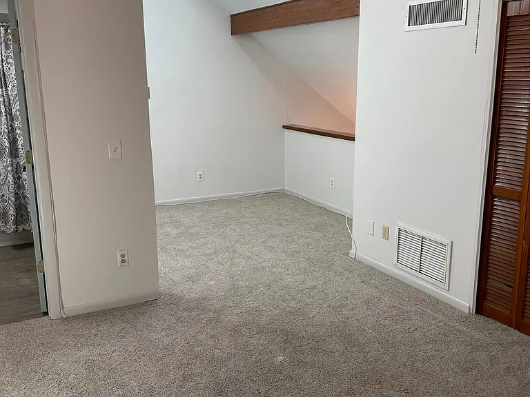view of 9 x 9' sitting area which is part of the Master Suite. The 2 skylights have solar powered blackout shades so you can control light & heat from them.